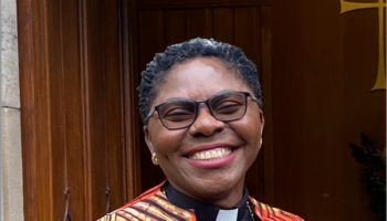 portrait of the author smiling